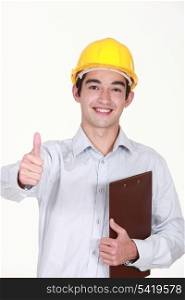 Thumbs up from a builder with a clipboard