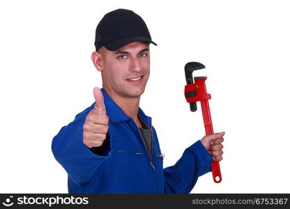 Thumbs up from a man with a wrench