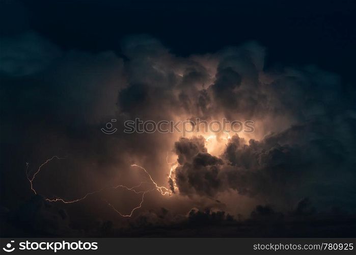 Thundercloud with beautiful lightning bolts in night sky