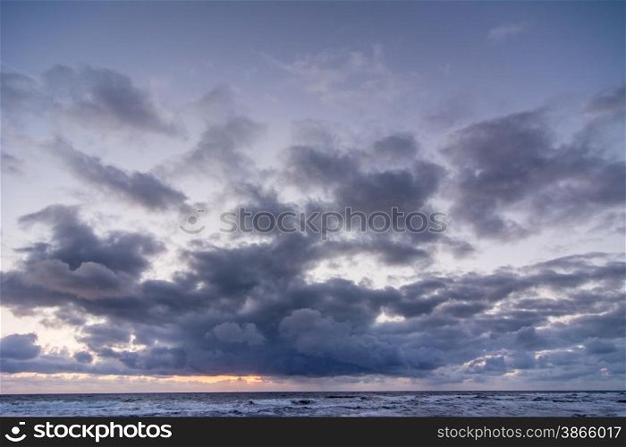 thunderclouds at sunset
