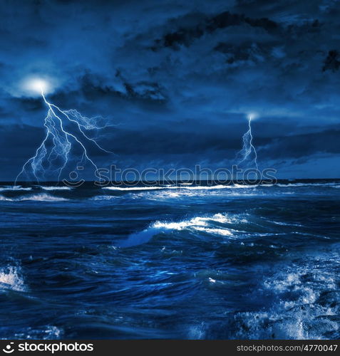 Thunderstorm in sea. Image of night stormy sea with big waves and lightning