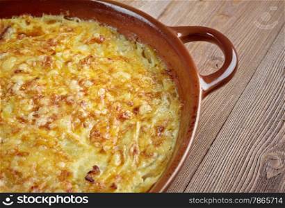 Tian de courgettes - French cuisine. casserole with zucchini and cheese