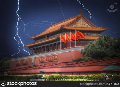 Tiananmen Square is located in the center of Beijing, the capital of the People&rsquo;s Republic of China. Bright flashes of lightning during a thunderstorm.. Tiananmen Square. Bright flashes of lightning during a thunderst