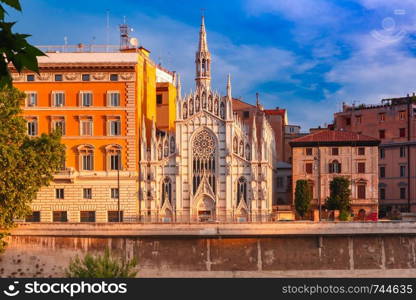 Tiber riverside with Church of the Sacred Heart of Jesus in Prati and mirror reflection in the morning in Rome, Italy. Church of the Sacred Heart in Prati, Rome, Italy