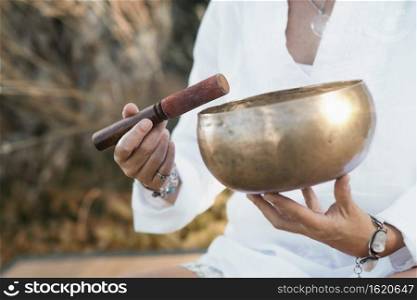 Tibetan singing bowl in sound therapy close up. Sound Healing, Tibetan Singing Bowl