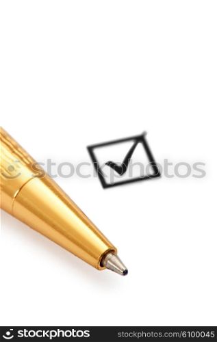Tick box and pen isolated on white