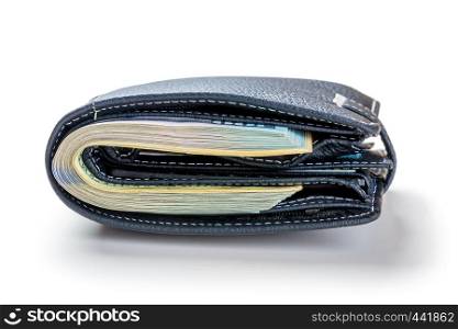 Tight-packed wallet with 100 dollar bills on a white background