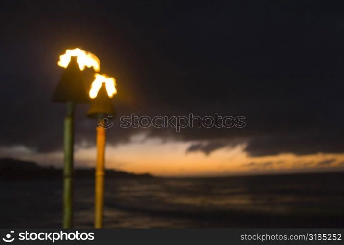 Tiki Torches at Sunset