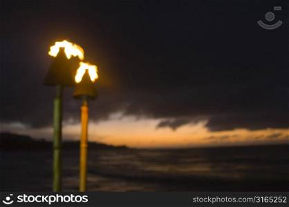 Tiki Torches at Sunset