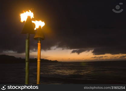 Tiki Torches at Sunset