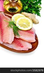 Tilapia fillets with dill, parsley and lemon in a clay pot, a bottle of vegetable oil, ginger, pink napkin isolated on white background
