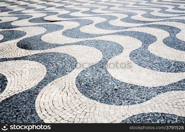 Tile brick floor in Lisbon Town Square , Portugal