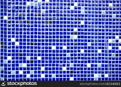 Tiled mosaic background with blue and white squares