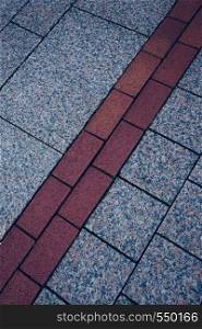 tiled pavement in the street in the city