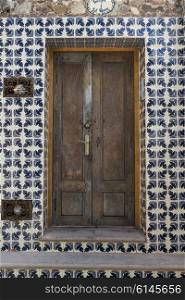 Tiled wall with a doorway to a house, Zona Centro, San Miguel de Allende, Guanajuato, Mexico