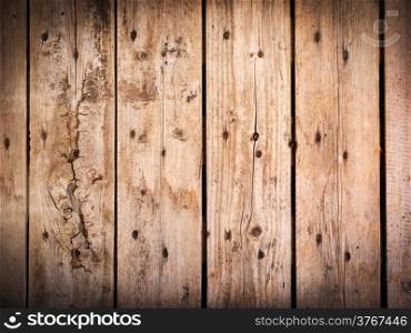 Timber background made of old, rough wooden planks with nails