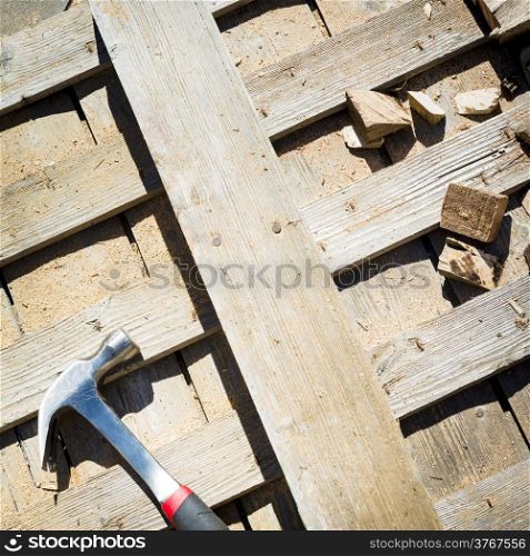 Timber off-cuts, sawdust and tools on a construction site