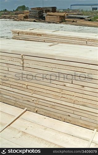 Timber. Planks and beams arranged