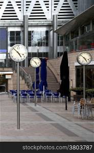 Time Canary Wharf Offices in London UK. Architecture and Clocks in the Canary Whalf Area in London United Kingdom