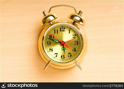 Time concept - alarm clock against the background