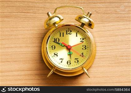 Time concept - alarm clock against the background