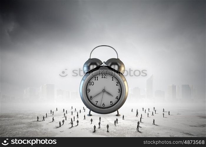 Time concept. Big old-style clock and many businesspeople around