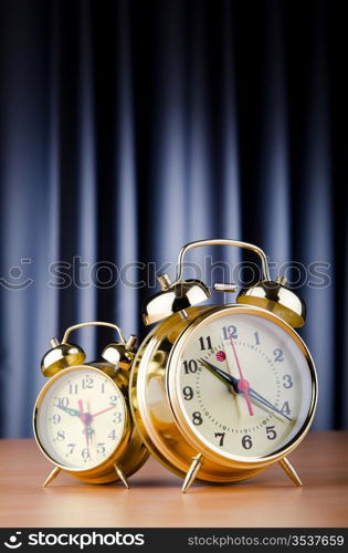 Time concept with alarm clock