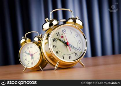 Time concept with alarm clock