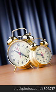 Time concept with alarm clock