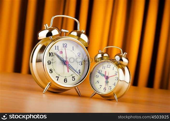 Time concept with alarm clock