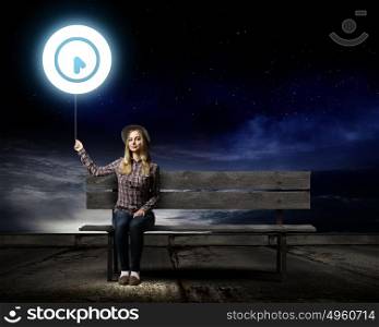 Time concept. Young woman in casual holding balloon with time concept