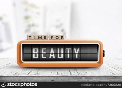 Time for beauty message on a retro alarm clock in a bright living room