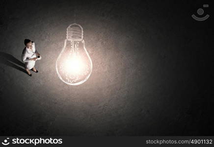 Time for break. Top view of businesswoman with cup of coffee in hands