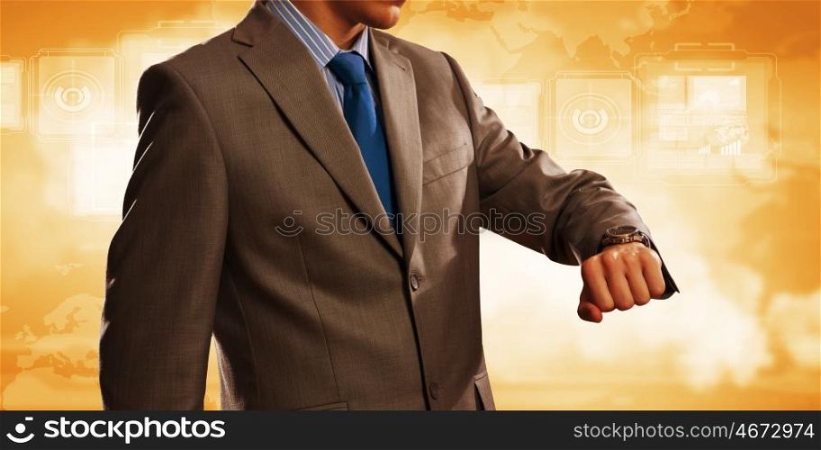 Time for business. Close up of businessman looking at watch