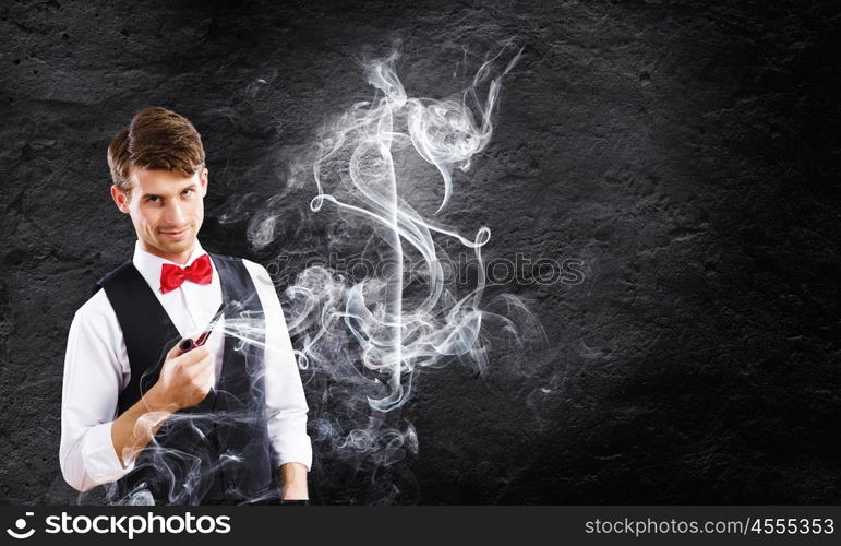 Time for business. Young handsome businessman smoking pipe. Money making