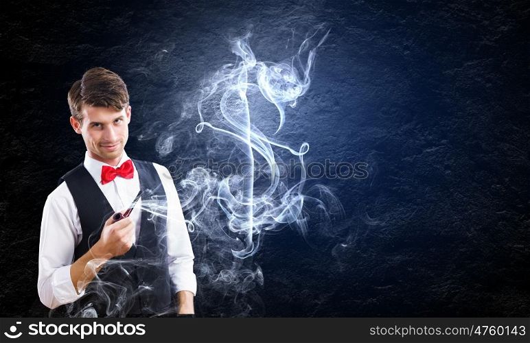Time for business. Young handsome businessman smoking pipe. Money making