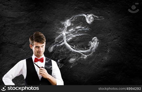 Time for business. Young handsome businessman smoking pipe. Money making