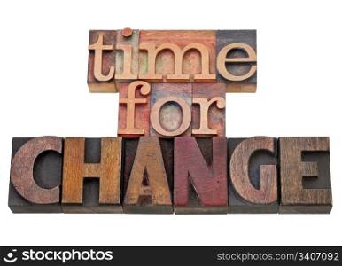 time for change - isolated text in vintage wood letterpress type, stained by color inks