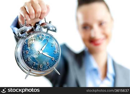 Time in business illustration with clock in hands of businesswoman. Elements of this image are furnished by NASA