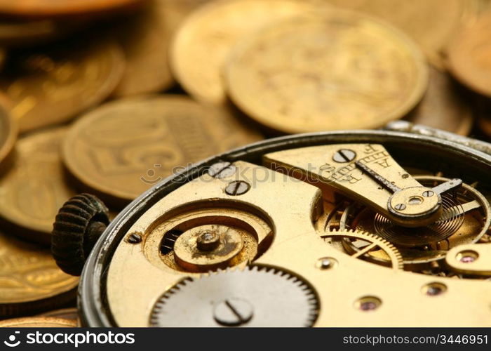 time is money coins and clock macro concet