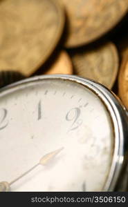 time is money coins and clock macro concet