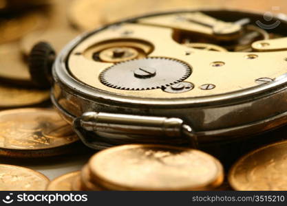 time is money coins and clock macro concet