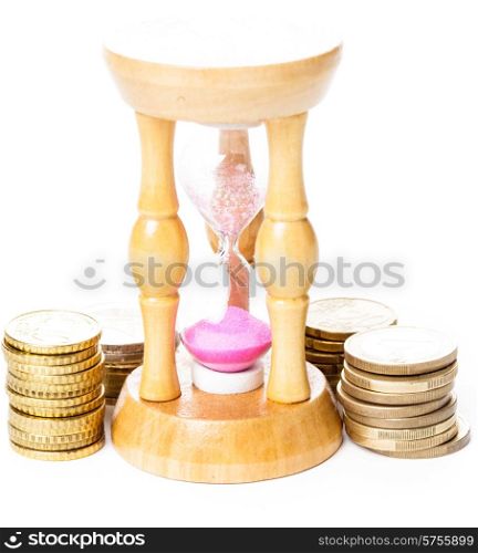 Time is money concept - coins and sandglass