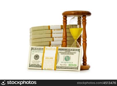 Time is money concept with dollars and hourglass