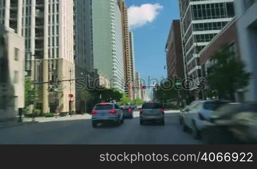 Time lapse camera car driving in Illinois. Chicago downtown financial district road rage. Gorgeous, high-energy US roads and streets time lapse. Great for any driving, corporate, city or urban scenics in the United States.
