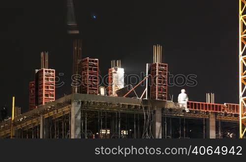 time lapse. night building construction.