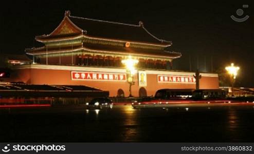 time lapse of city traffic at night, Tiananmen, Beijing, China.