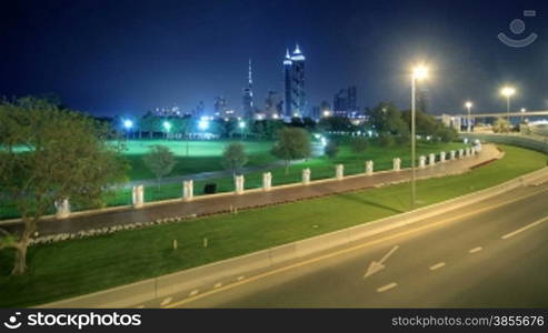 Time Lapse Of Dubai Night Against The Burj Khalifa. HD Video.