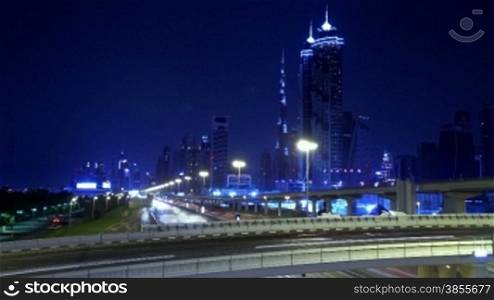 Time Lapse Of Dubai Night Against The Burj Khalifa. HD Video.