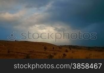 Time lapse of hilly landscape in summer